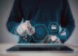 Man clicks on a digital overlay featuring icons for online security, management, and statistics.